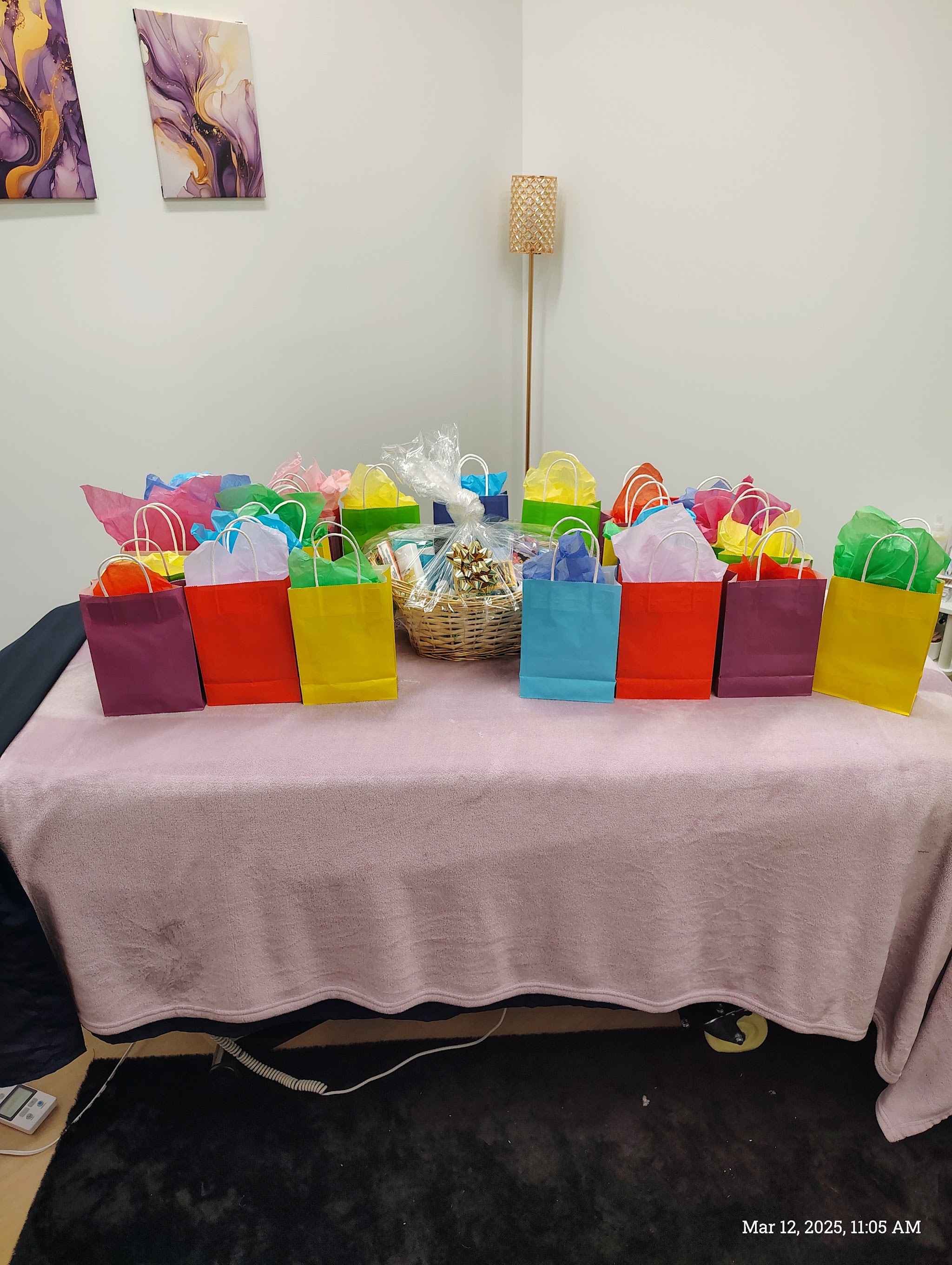 A table dressed with colorful gift bags