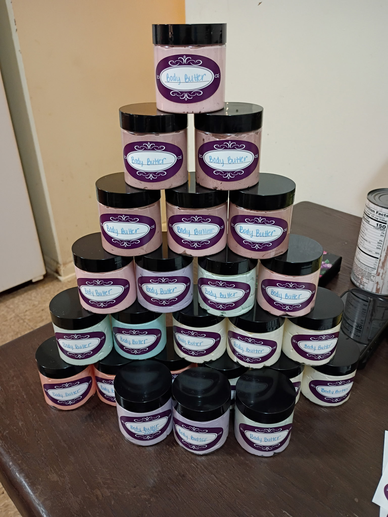 Jars stacked in a pyramid on a table